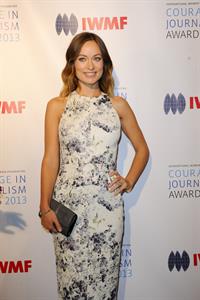 Olivia Wilde debuts her small baby bump while attending the 2013 International Women’s Media Foundation’s Courage in Journalism Awards at the Beverly Hills Hotel on Tuesday (October 29, 2013) in Beverly Hills, Calif.