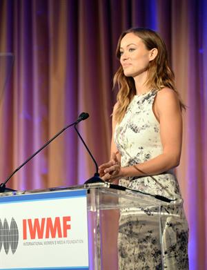 Olivia Wilde debuts her small baby bump while attending the 2013 International Women’s Media Foundation’s Courage in Journalism Awards at the Beverly Hills Hotel on Tuesday (October 29, 2013) in Beverly Hills, Calif.