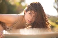 Ava Taylor in lingerie by the pool