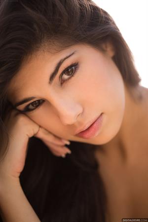 Ava Taylor in lingerie by the pool