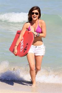 Lucy Hale and Ashley Benson photoshoot at the Bondo Bikini Shack on Miami Beach on March 24, 2012