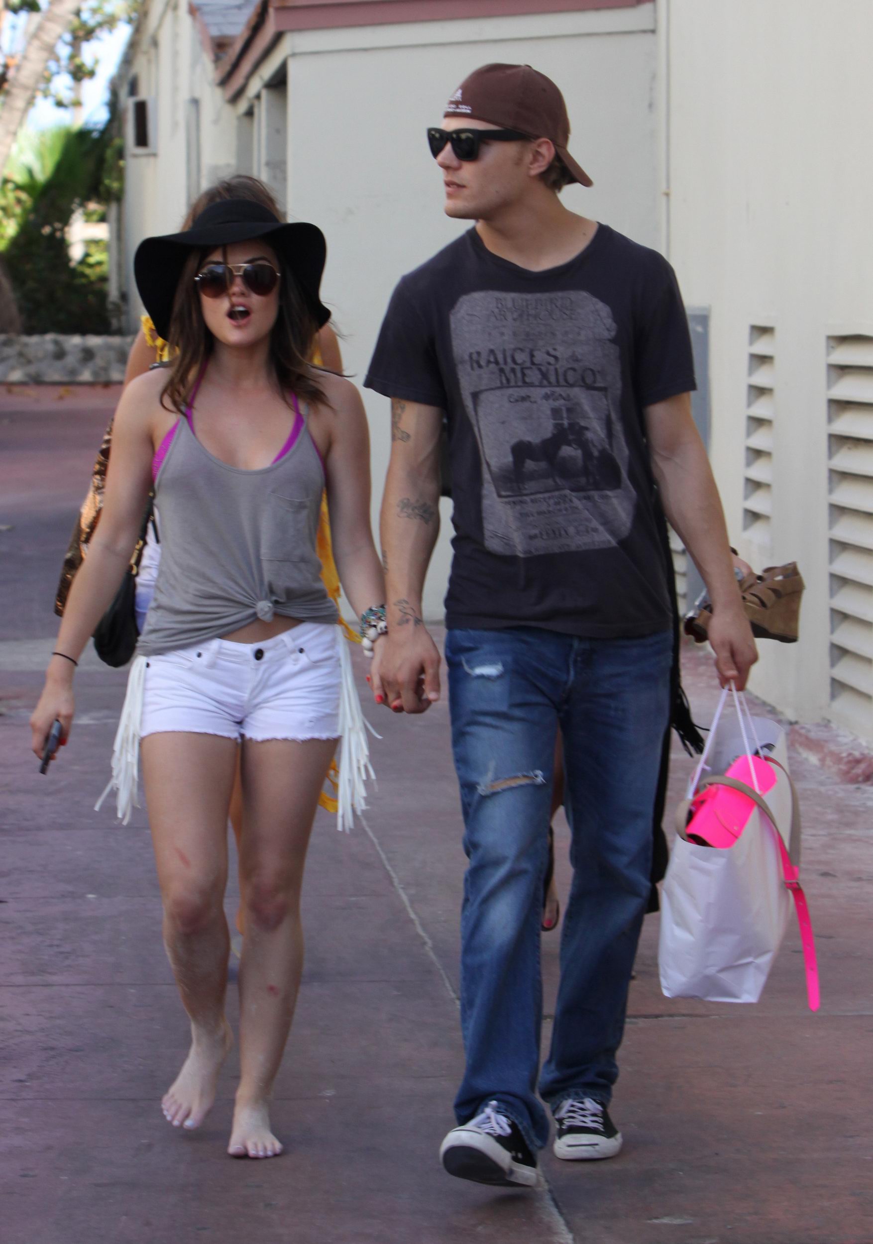 Lucy Hale and Ashley Benson photoshoot at the Bondo Bikini Shack on Miami Beach on March 24, 2012