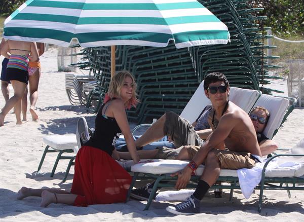Lucy Hale and Ashley Benson photoshoot at the Bondo Bikini Shack on Miami Beach on March 24, 2012