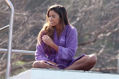 Katherine Webb, Miss Alabama USA 2012, in a pink swimsuit on the set for the TV show 'Celebrity Diving' in Los Angeles.