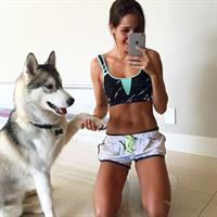 Kayla Itsines taking a selfie