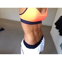 Kayla Itsines taking a selfie