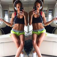 Kayla Itsines taking a selfie