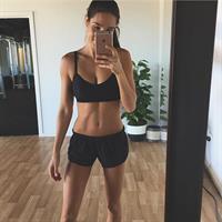 Kayla Itsines taking a selfie