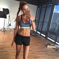 Kayla Itsines taking a selfie