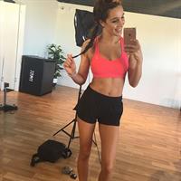 Kayla Itsines taking a selfie