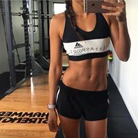 Kayla Itsines taking a selfie