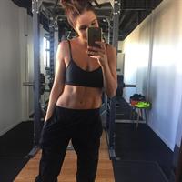 Kayla Itsines taking a selfie