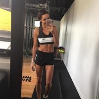 Kayla Itsines taking a selfie