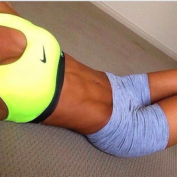 Kayla Itsines taking a selfie