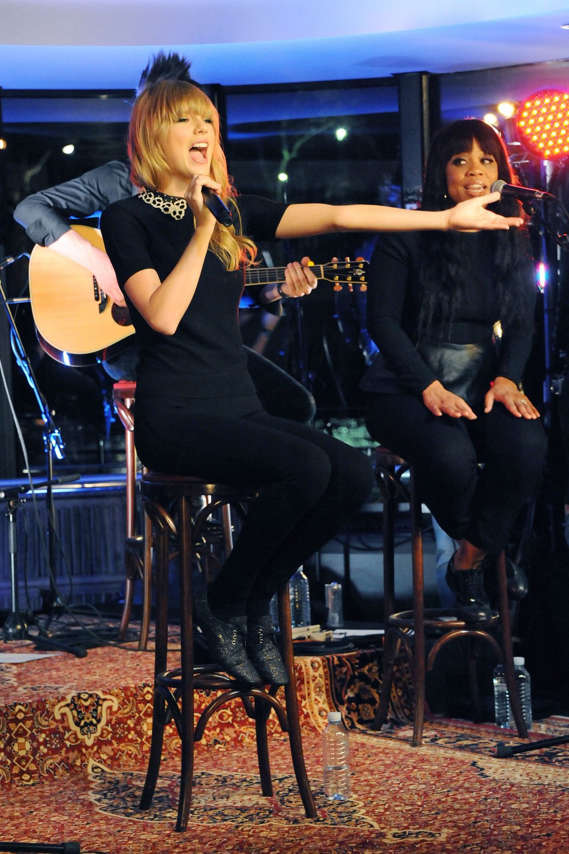 Taylor Swift performs at a private concert for NRJ on a barge on The Seine January 28, 2013 