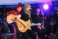Taylor Swift performs at a private concert for NRJ on a barge on The Seine January 28, 2013 
