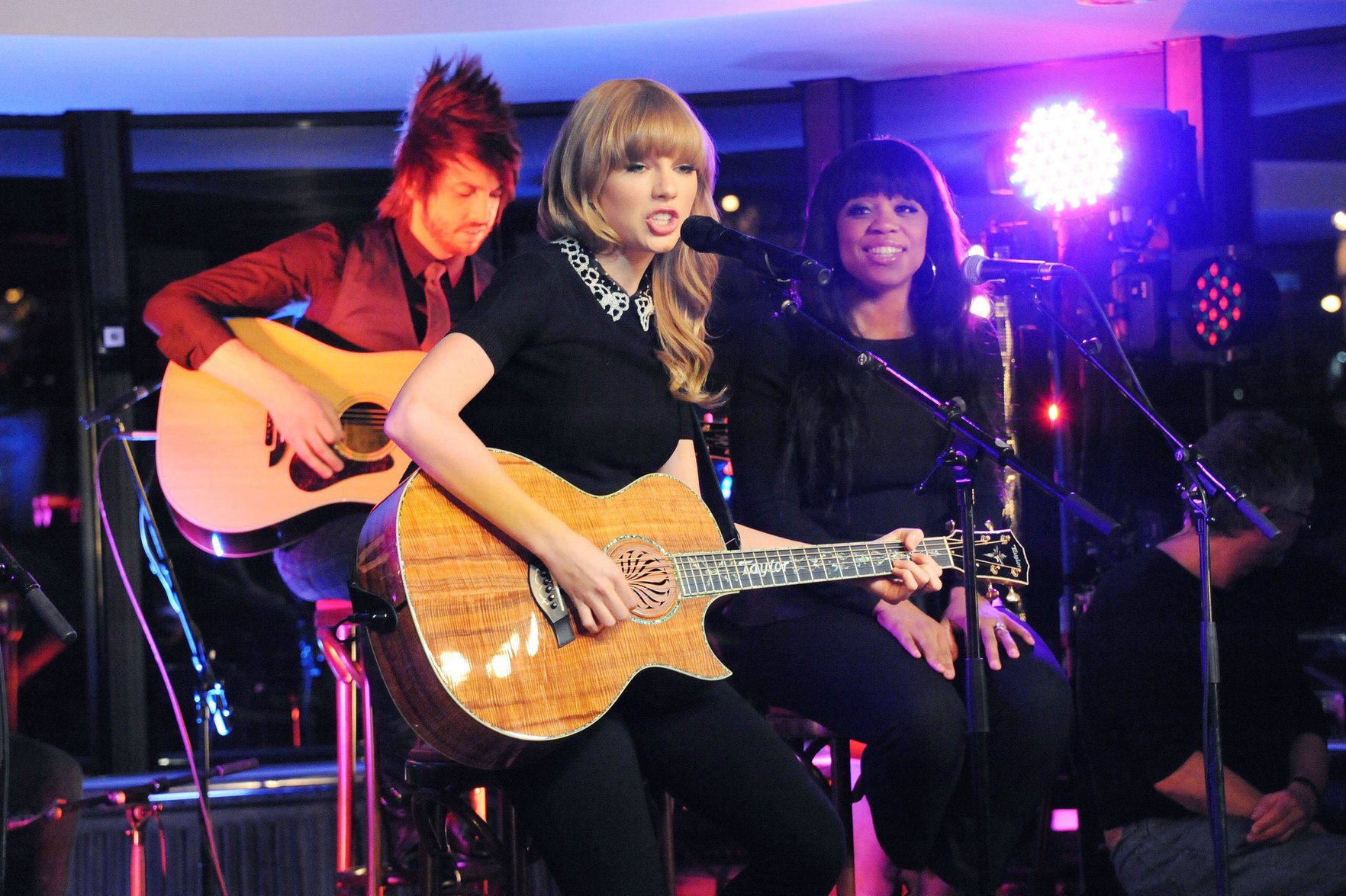 Taylor Swift performs at a private concert for NRJ on a barge on The Seine January 28, 2013 
