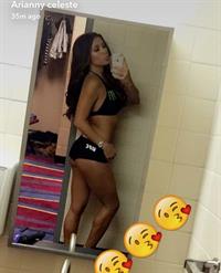 Arianny Celeste in a bikini taking a selfie and - ass