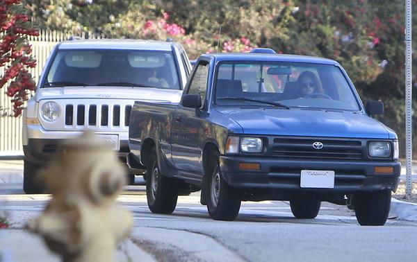 Kristen Stewart driving in Los Angeles - October 30, 2013  