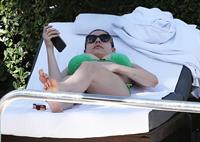 Kelly Brook bikini candids by the pool in Miami 2/1/13 