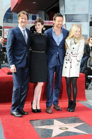 Anne Hathaway attends the Hugh Jackman Hollywood Walk Of Fame Ceremony in Hollywood December 13-2012 