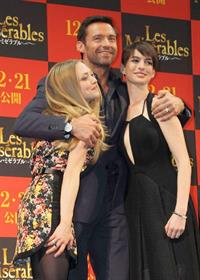 Anne Hathaway poses for photographers during an event to promote their latest movie 'Les Miserables' in Tokyo