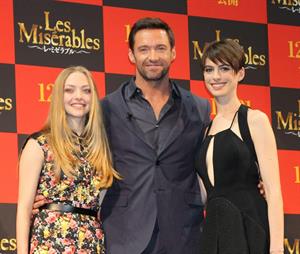 Anne Hathaway poses for photographers during an event to promote their latest movie 'Les Miserables' in Tokyo