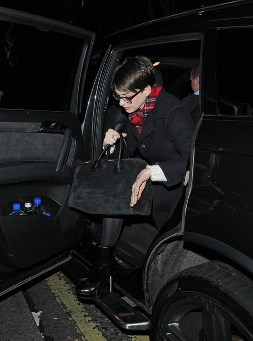 Anne Hathaway leaving her hotel and heading to the Empire Cinema Theatre in London - December 4, 2012