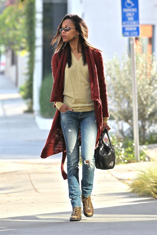 Zoe Saldana out and about in West Hollywood wearing a long red sweater coat January 19-2012 