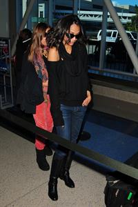Zoe Saldana at LA Airport - February 20, 2010  