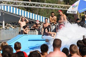 Katy Perry talks with a group of her friends after spending the afternoon at Raging Waters in San Dimas, California on August 12, 2012