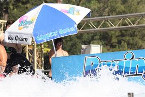 Katy Perry talks with a group of her friends after spending the afternoon at Raging Waters in San Dimas, California on August 12, 2012
