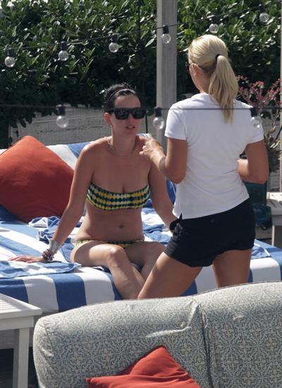 Katy Perry - In a bikini at a hotel pool in Miami July 27, 2012