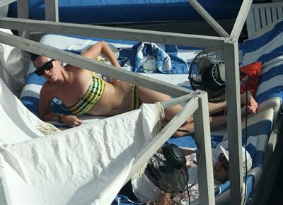 Katy Perry - In a bikini at a hotel pool in Miami July 27, 2012