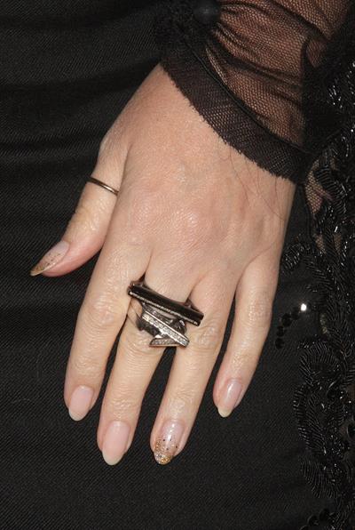 Kylie Minogue in a tight black mini dress for the launching of her book 'Kylie Fashion' at Saks Fifth Avenue