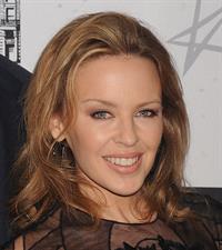 Kylie Minogue in a tight black mini dress for the launching of her book 'Kylie Fashion' at Saks Fifth Avenue