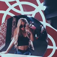 Tana Mongeau taking a selfie