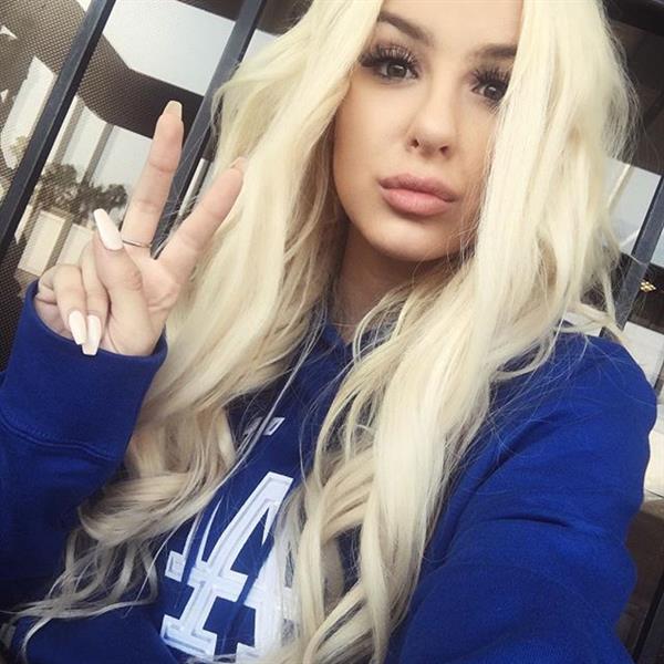 Tana Mongeau taking a selfie