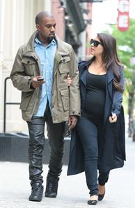 Kim Kardashian Takes an early morning stroll with Kanye West in SoHo (May 6, 2013) 