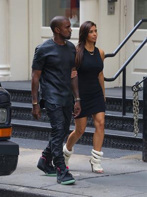 Kim Kardashian and Kanye West walk around SoHo in New York City 