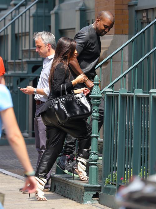 Kim Kardashian and Kanye West walk around SoHo in New York City 