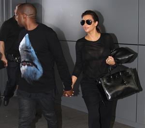 Kim Kardashian and Kanye West JFK airport in New York - 09 August 2012 