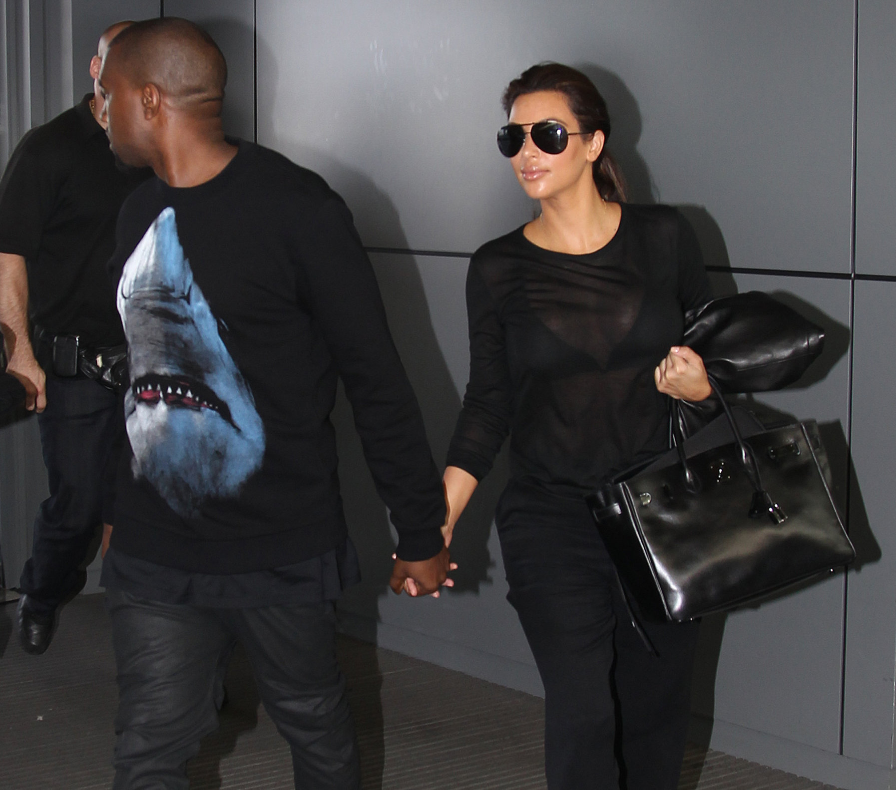 Kim Kardashian and Kanye West JFK airport in New York - 09 August 2012 