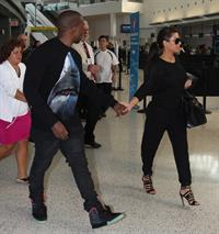 Kim Kardashian and Kanye West JFK airport in New York - 09 August 2012 