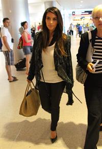 Kim Kardashian catches a flight out of Miami October 4, 2012 