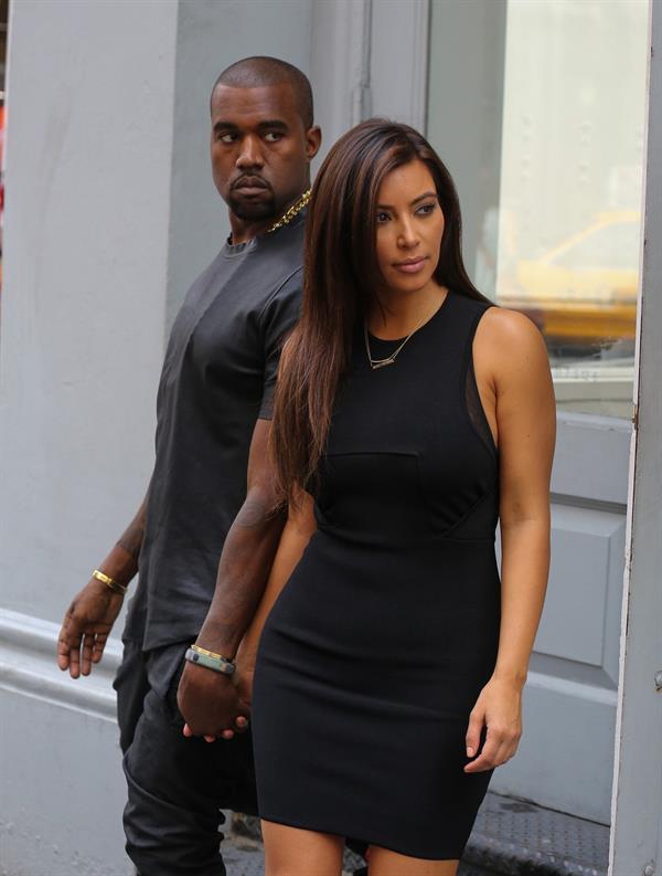 Kim Kardashian and boyfriend Kanye West walk around SoHo in New York City. They stopped at Alexander Wang to do some shopping. August 8, 2012