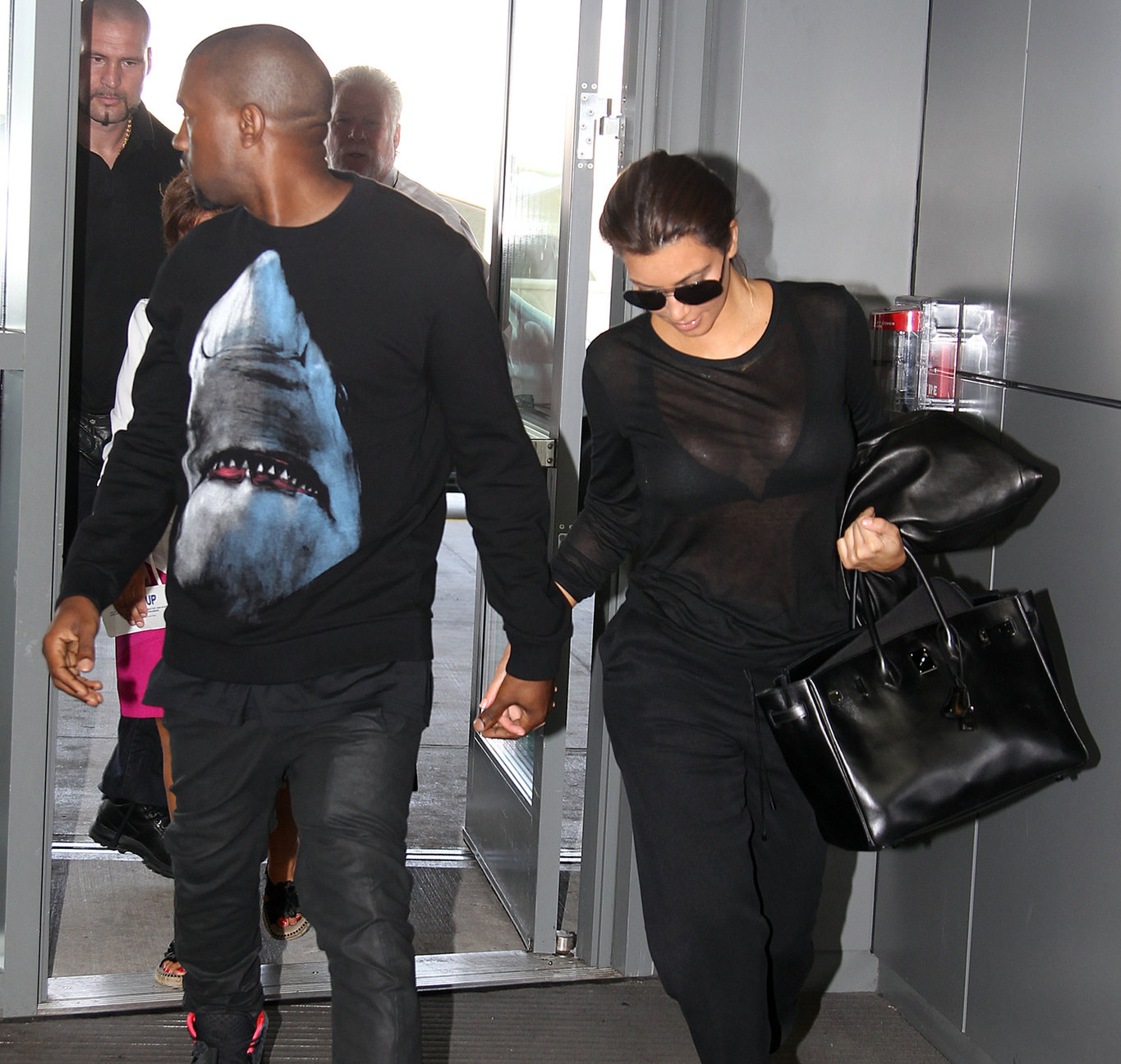 Kim Kardashian - JFK airport in New York on August 9, 2012