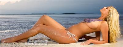 2013 Sports Illustrated Swimsuit Edition.  Kate Upton in body paint
