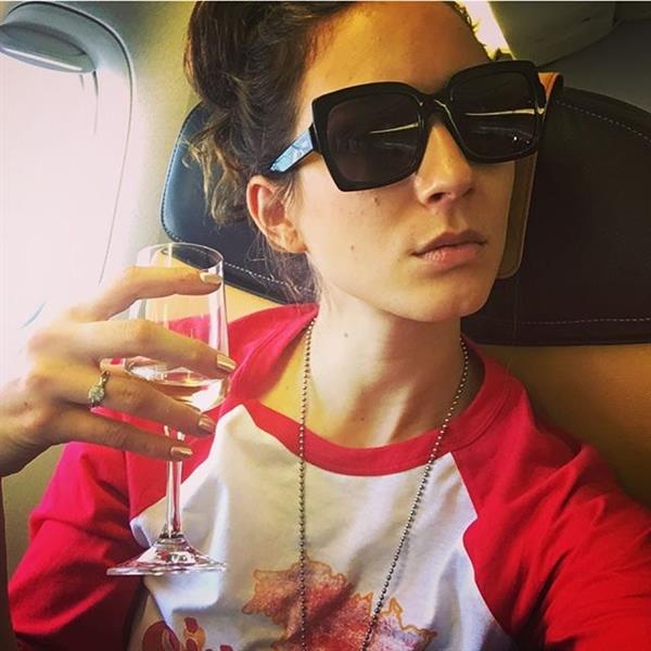 Troian Bellisario taking a selfie