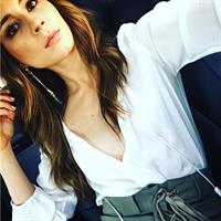 Troian Bellisario taking a selfie